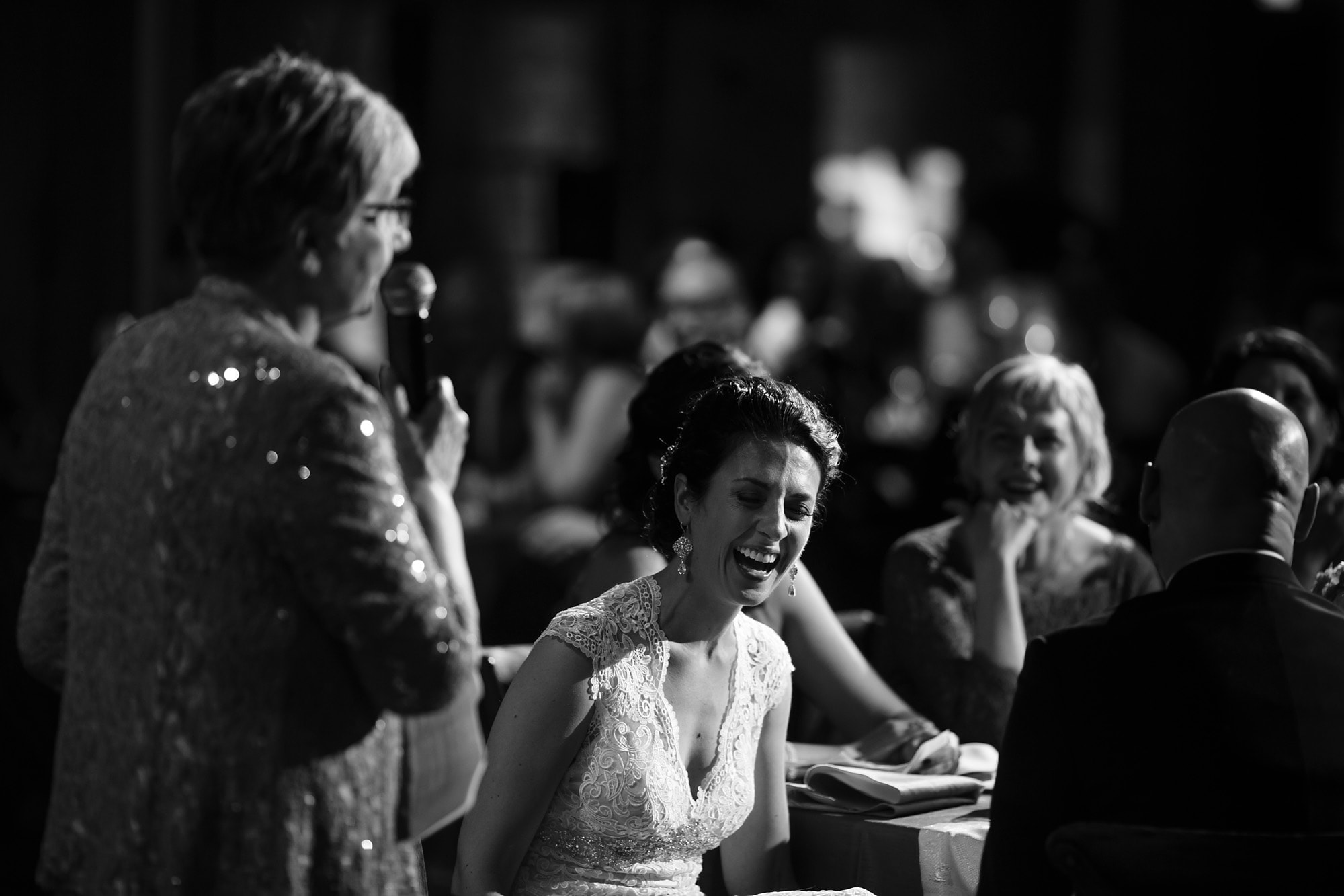 Christina laughs as her mother give a speech during her Bridgeport Art Center Wedding