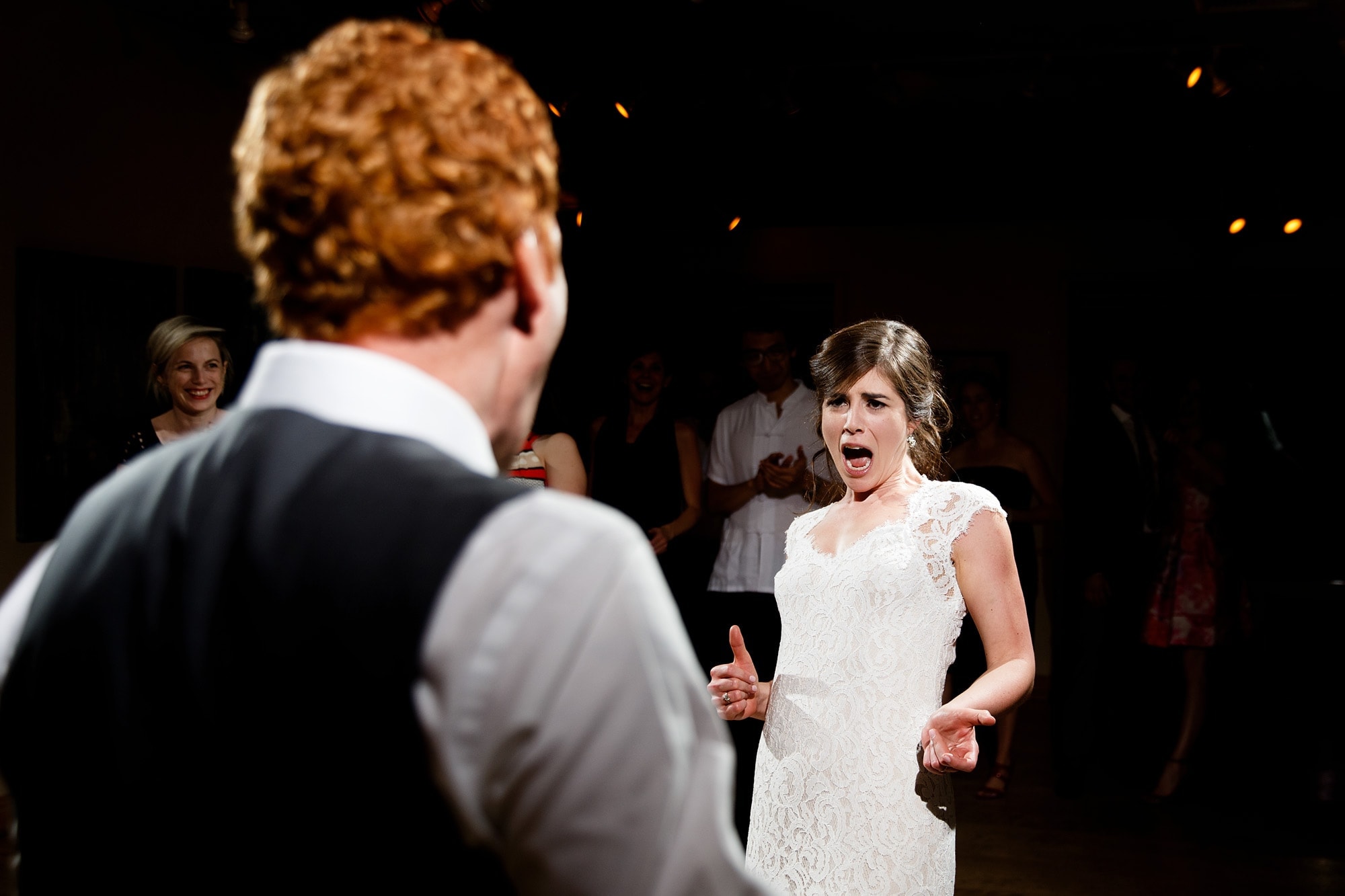 The bride dances with the groom at Rembrandt yard during their reception in Boulder