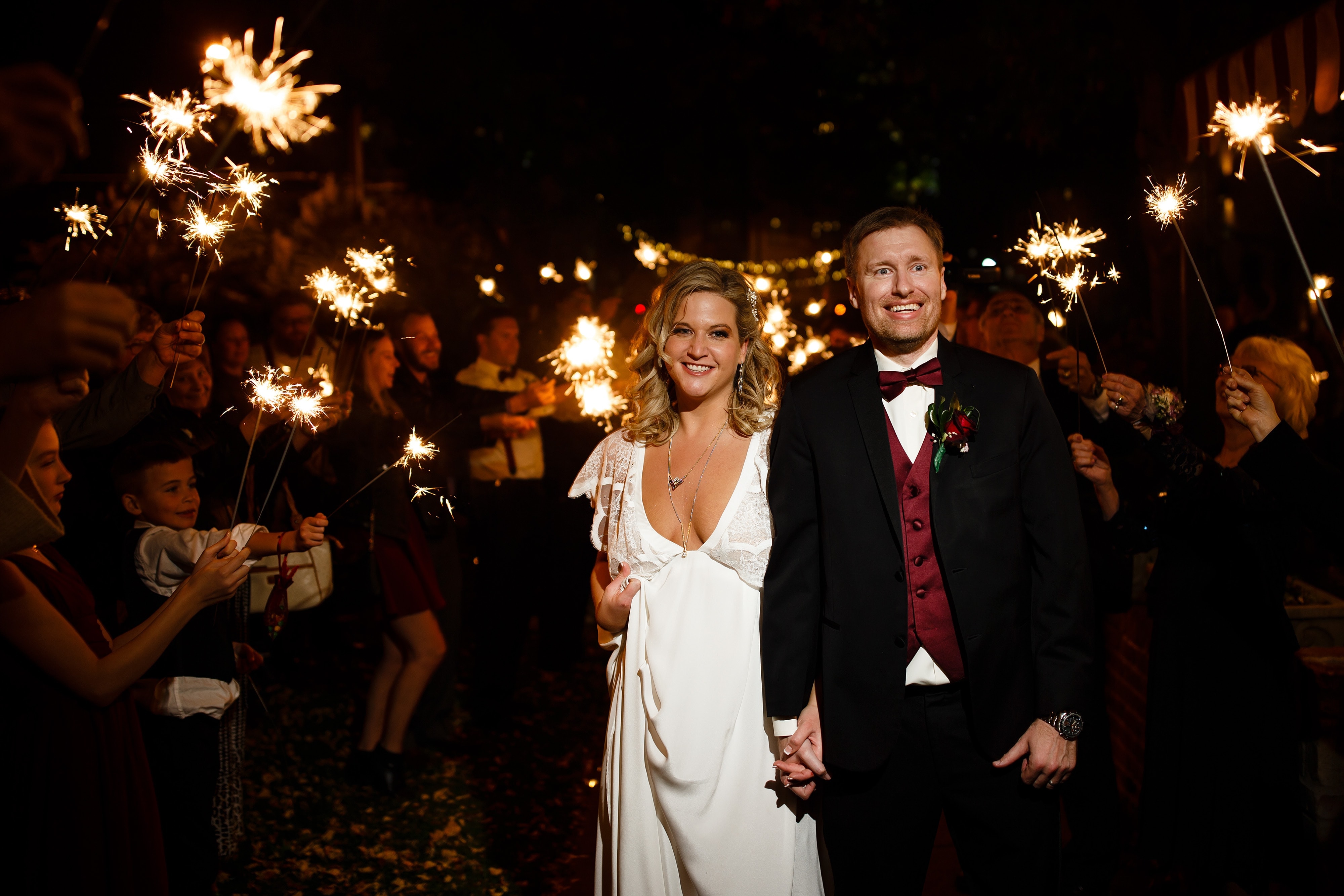 Sarah and Ryan celebrate the end of their fall wedding in Denver at The Lobby restaurant with a sparkler exit