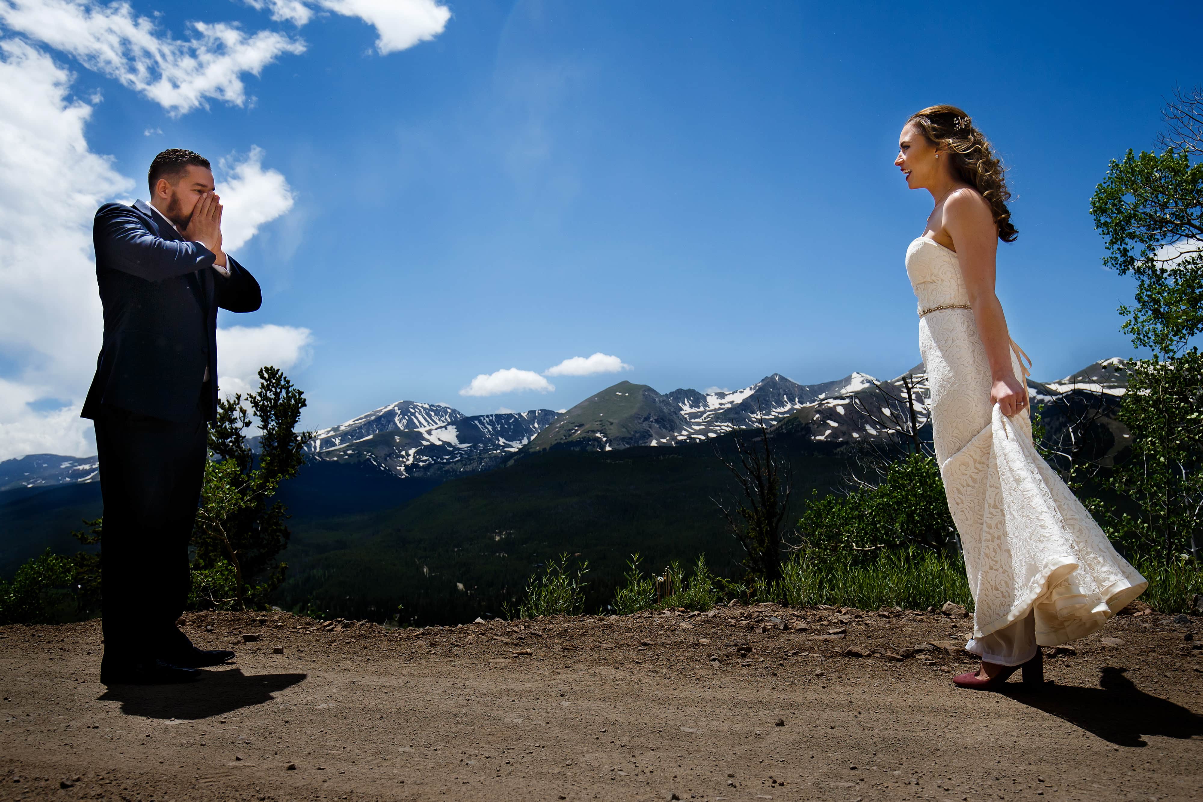 Nick and Sharon react to seeing each other during their first look on Boreas Pass Road in Breckenridge before their wedding at TenMile Station