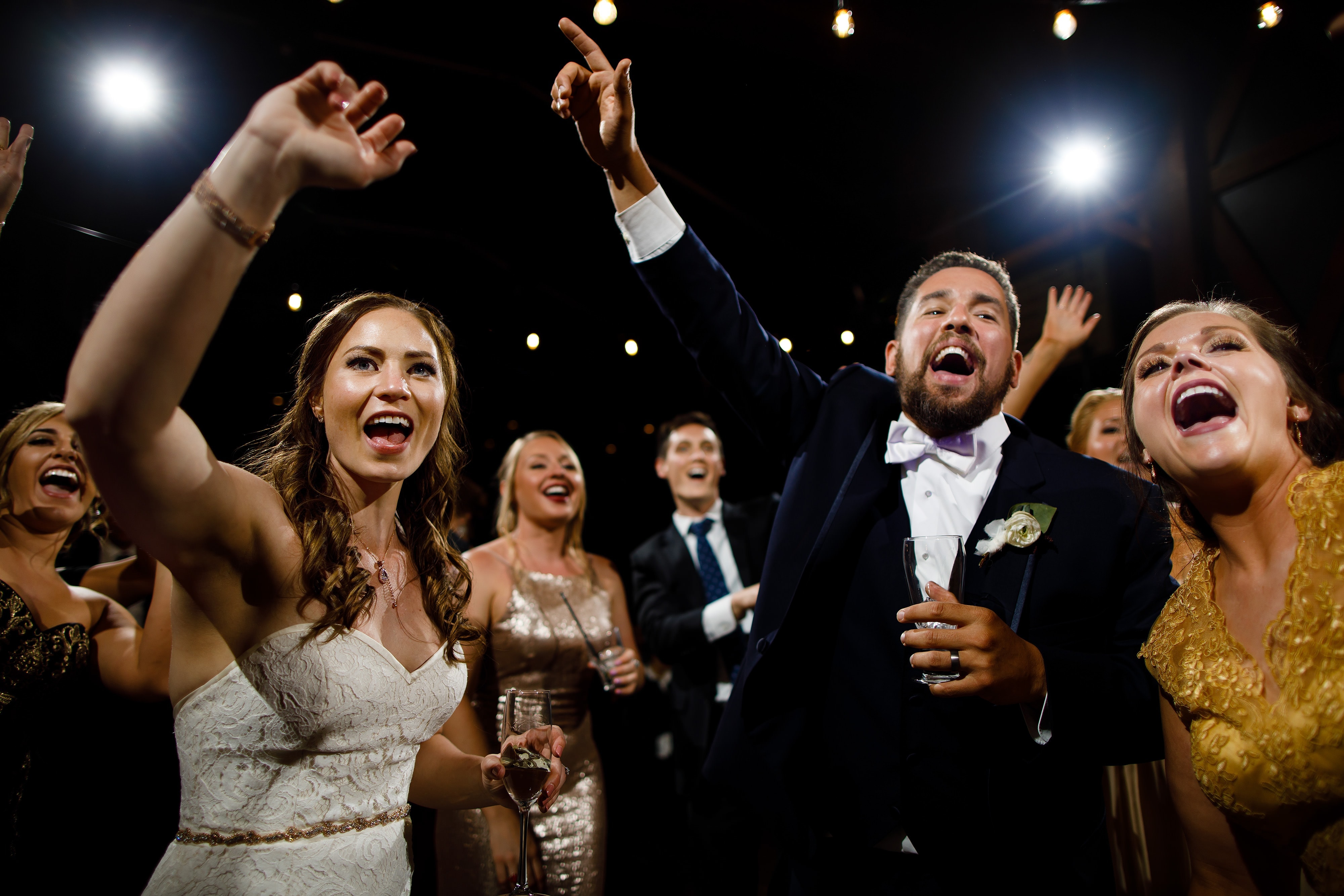 Nick and Sharon dance with friends at their TenMile Station wedding in Breckenridge
