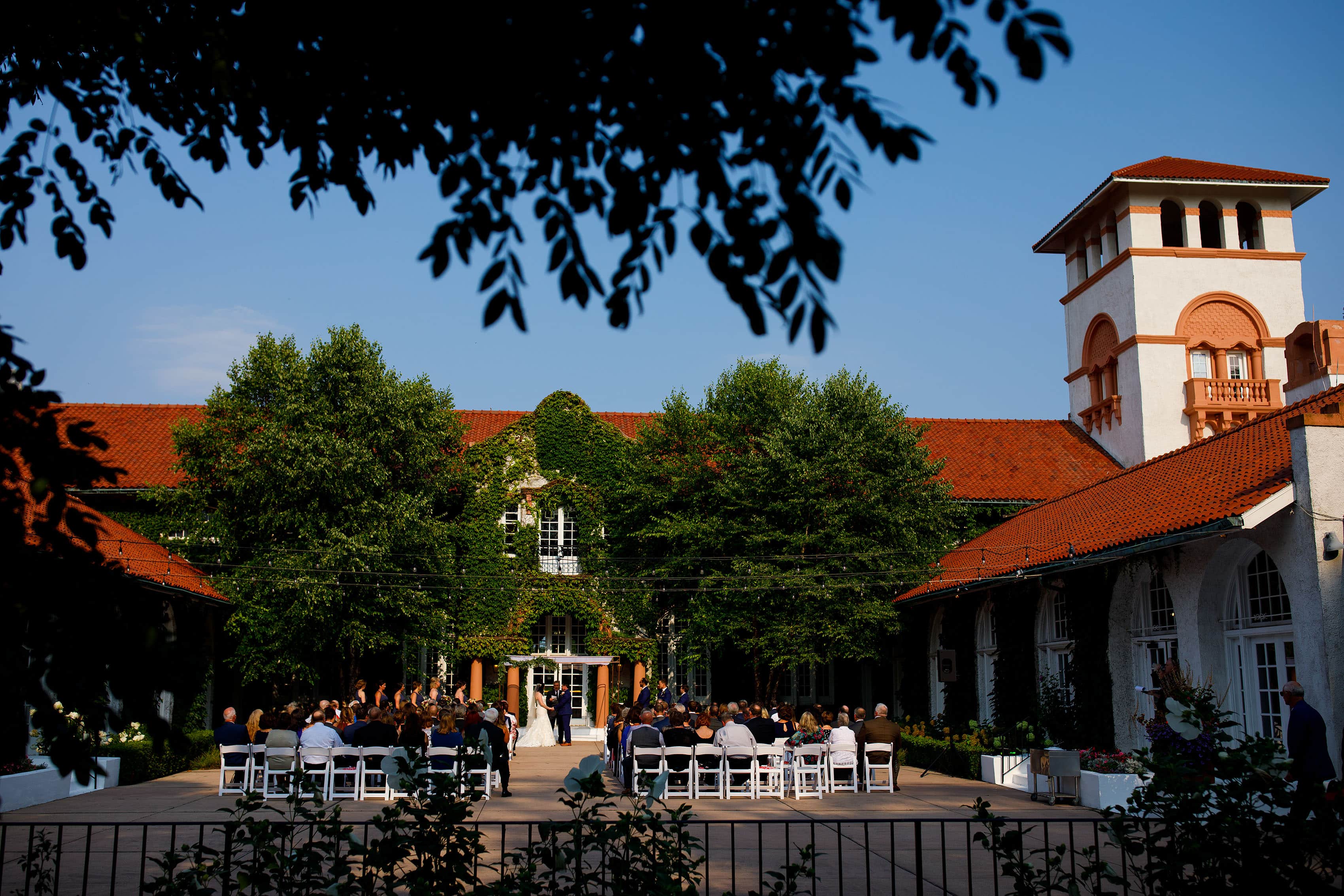 Summertime ceremony during a Ravisloe Country Club wedding