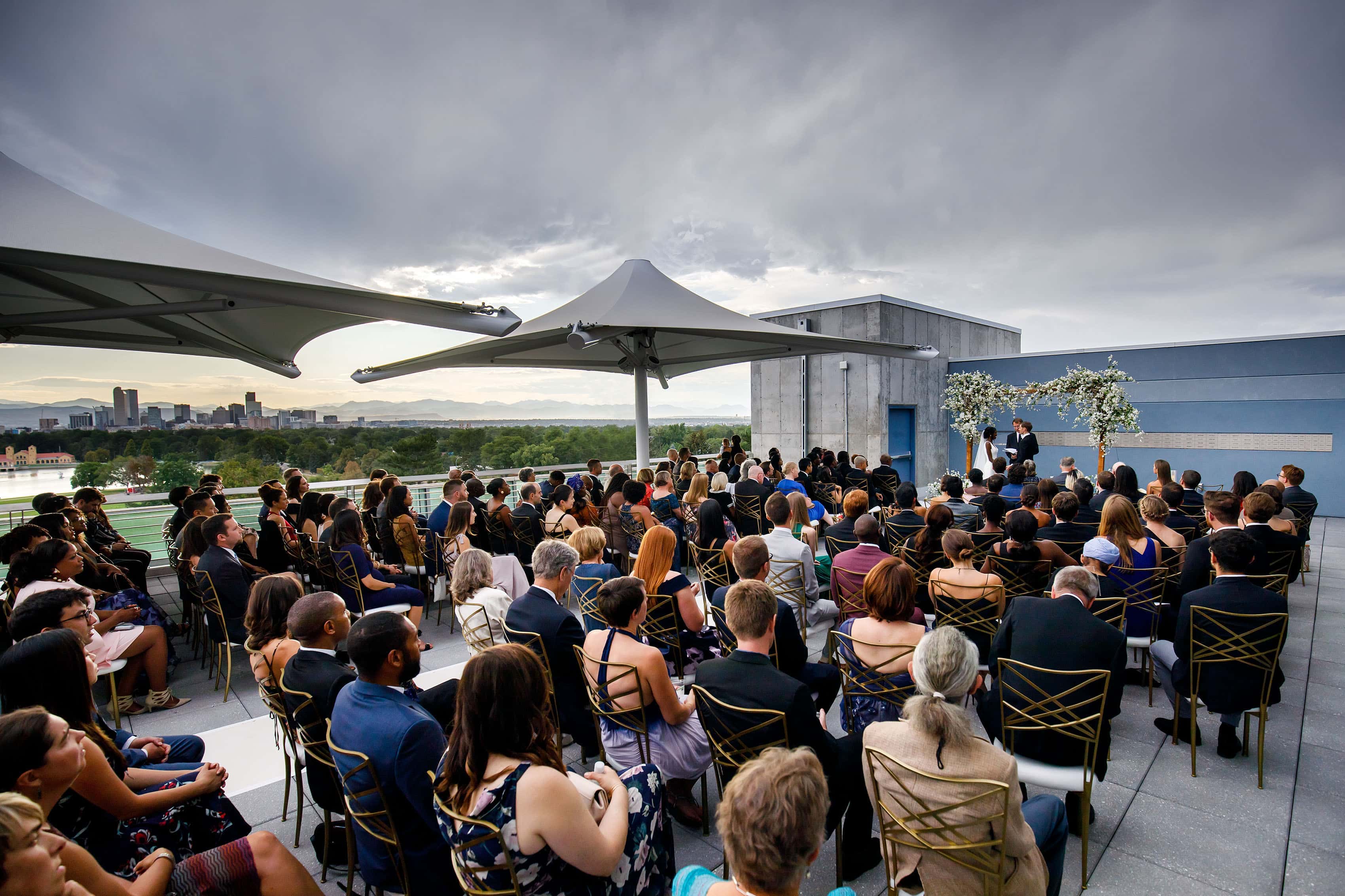 Rooftop wedding ceremony at the Denver Museum of Nature and Science