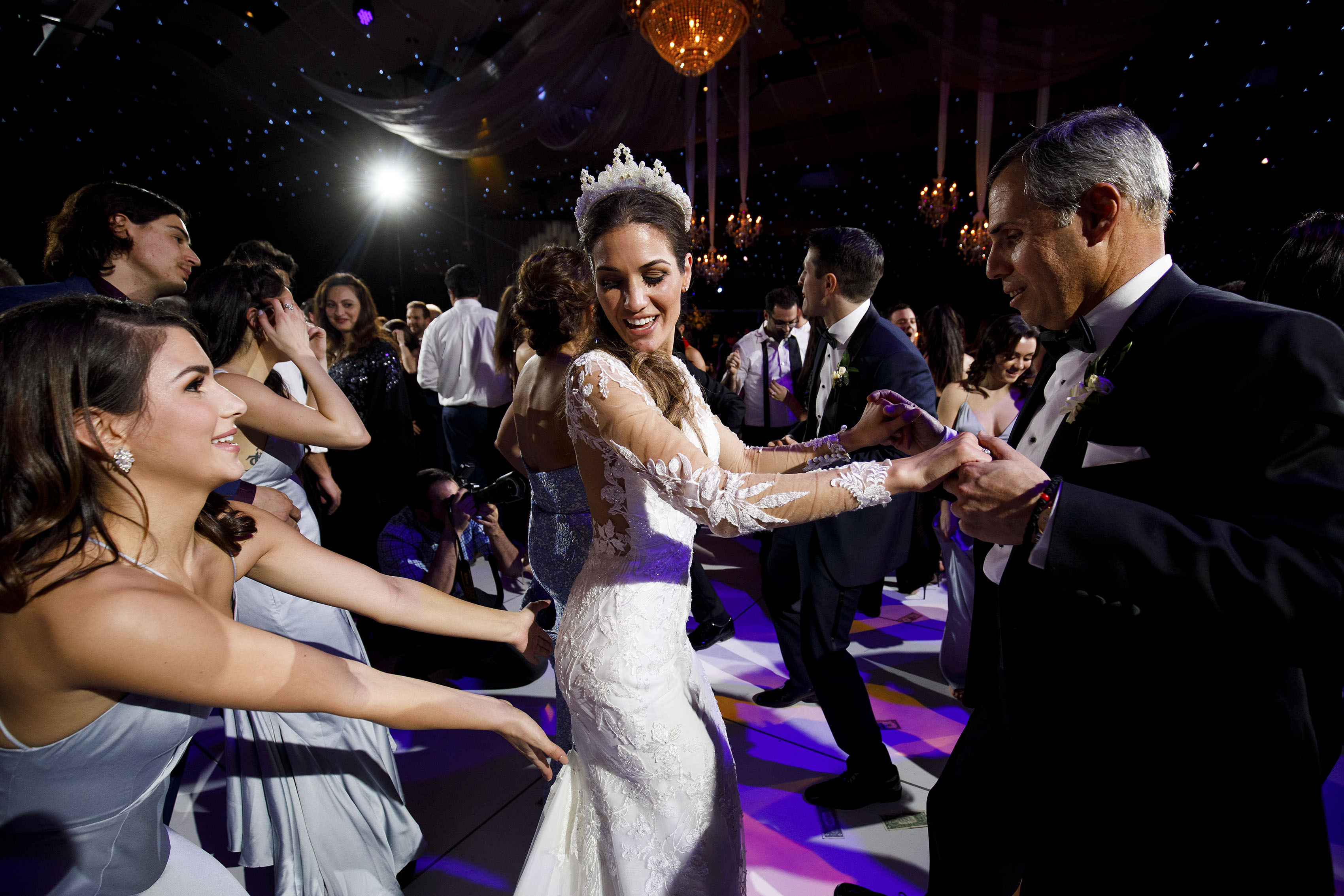 Guests dance during a wedding recetion at Seawell Ballroom