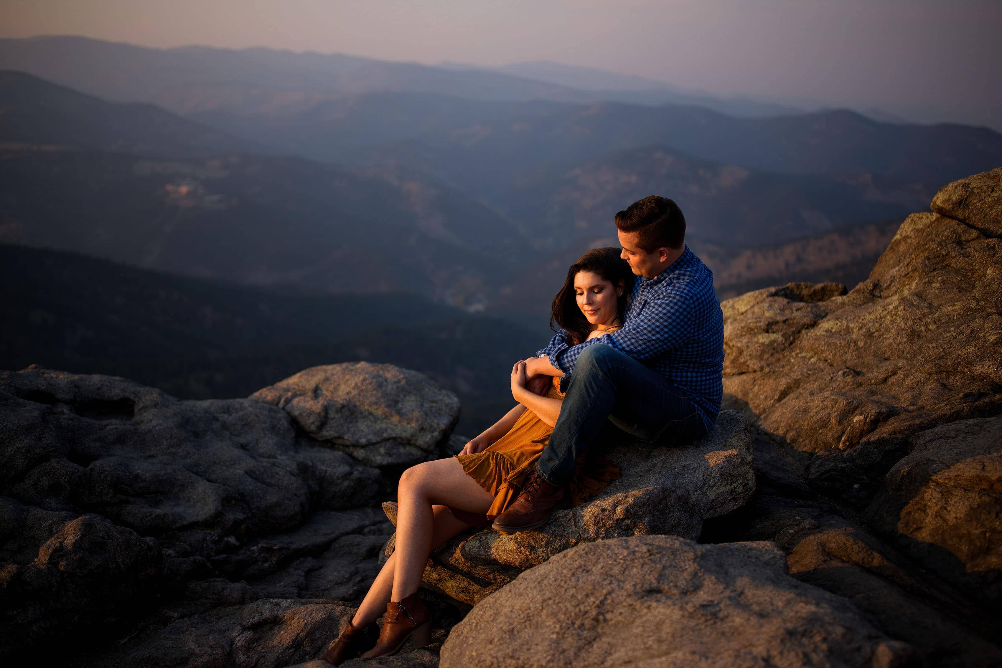 A couple share a moment together at Lost Gulch Lookout in Boulder during their engagement session